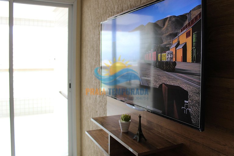 Apartamento com sacada gourmet e linda vista para praia