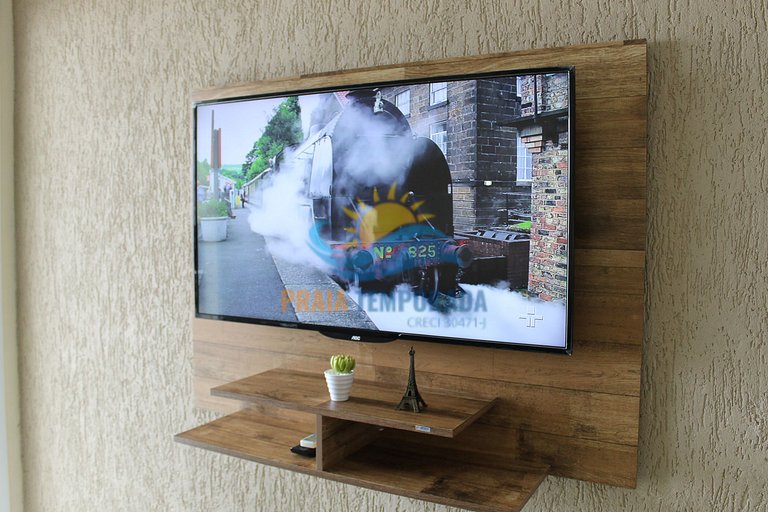 Apartamento com sacada gourmet e linda vista para praia