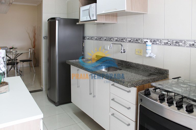 Apartamento com sacada gourmet e linda vista para praia