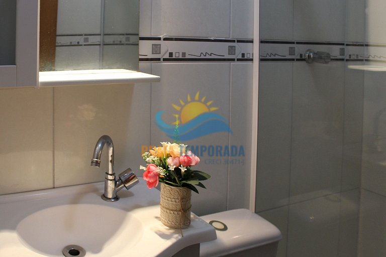 Apartamento com sacada gourmet e linda vista para praia