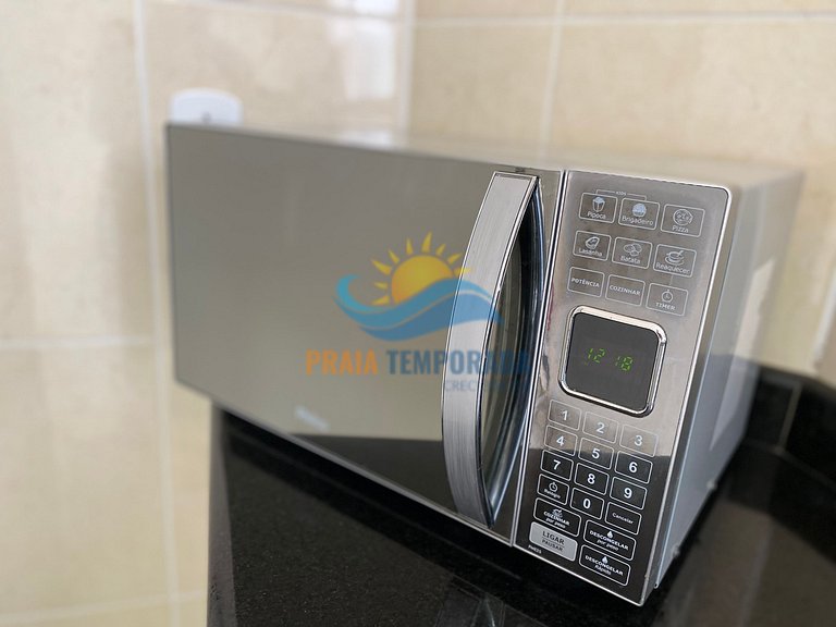 Apartamento 2 dormitórios com piscina e vista pro mar
