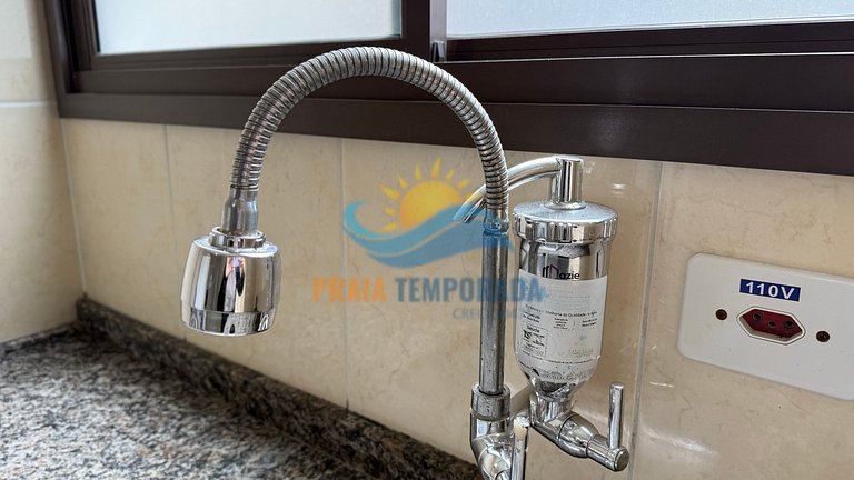 Apartamento frente ao mar com piscina com cascata