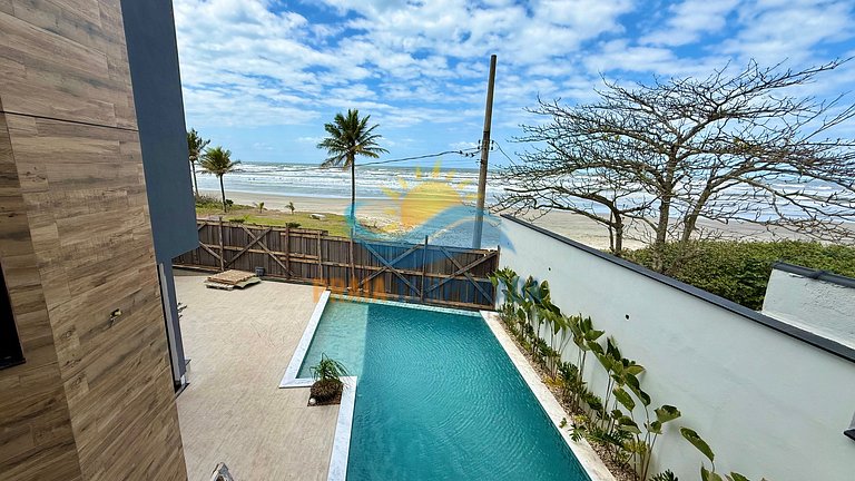 Suíte em pousada com vista panorâmica para o mar e banheira