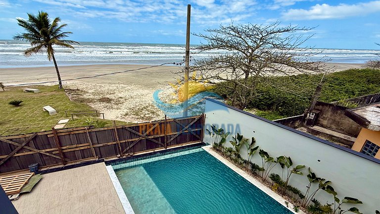 Suíte em pousada com vista panorâmica para o mar e banheira