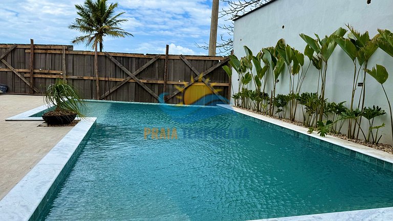 Suíte em pousada com vista panorâmica para o mar e banheira